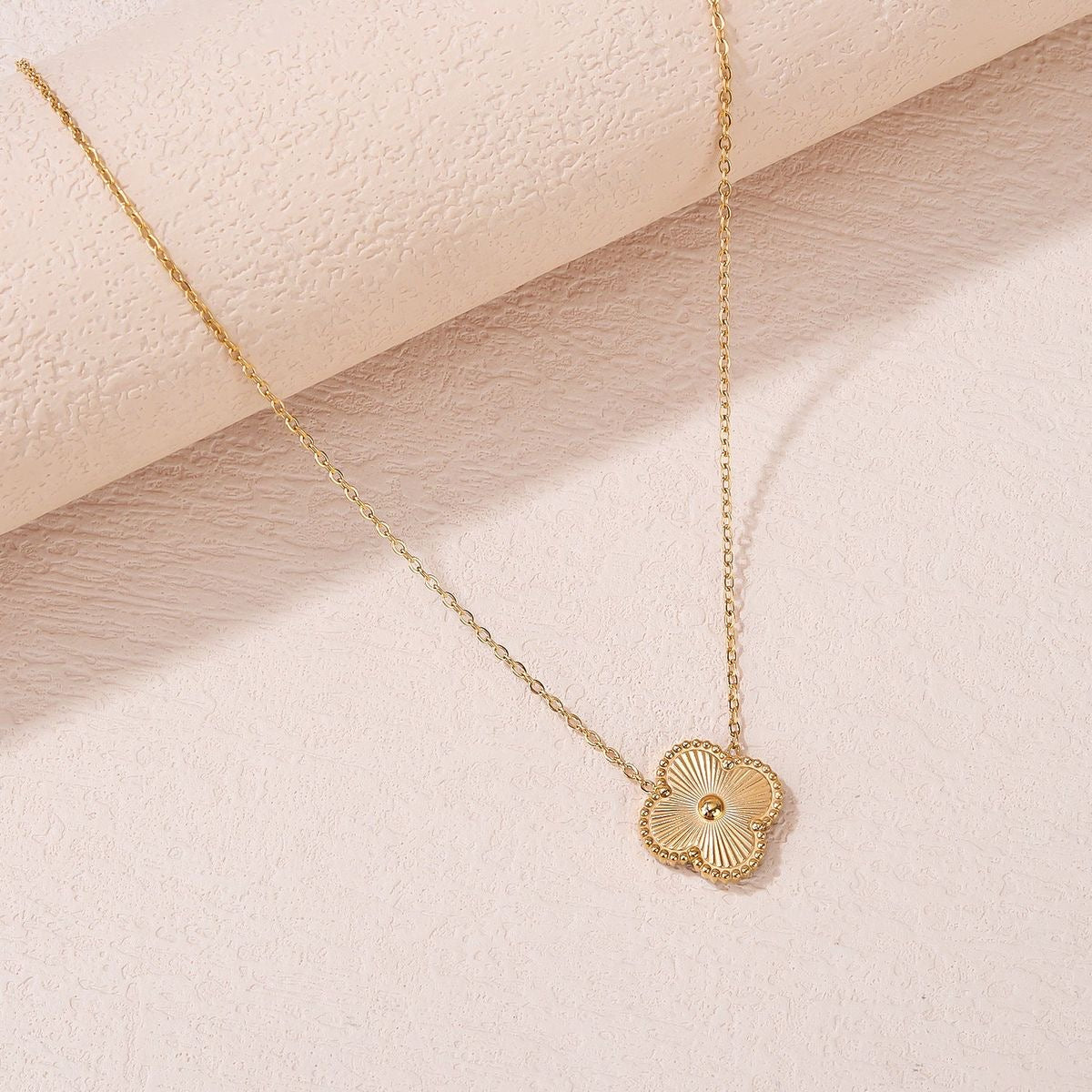 Golden clover necklace