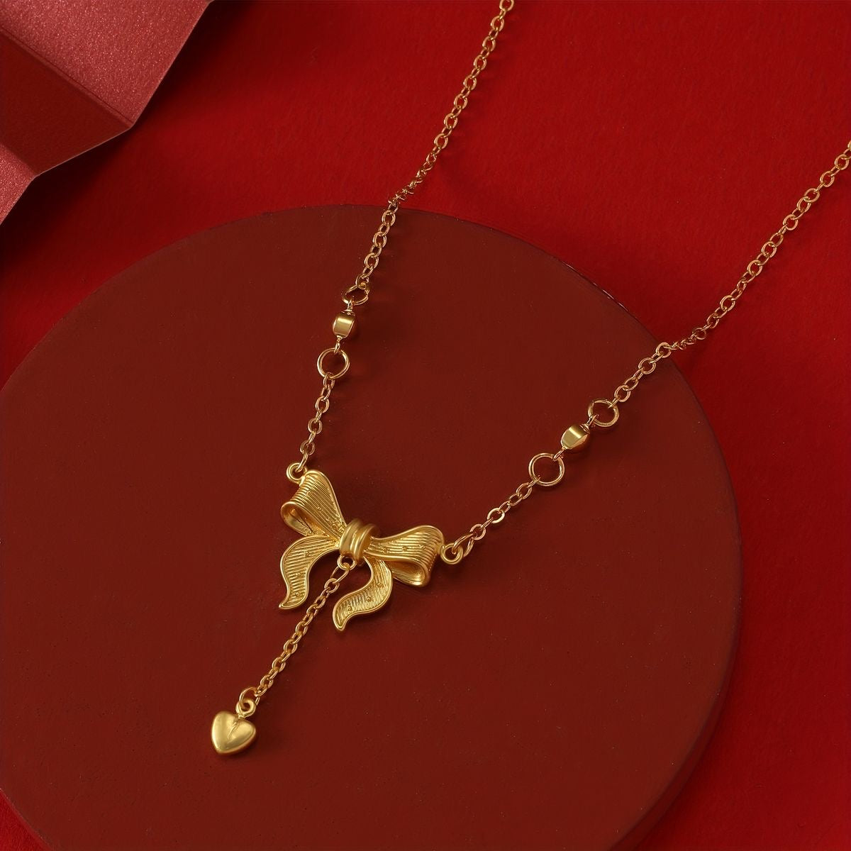 Bow drop necklace