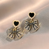 Mini bling bow earrings