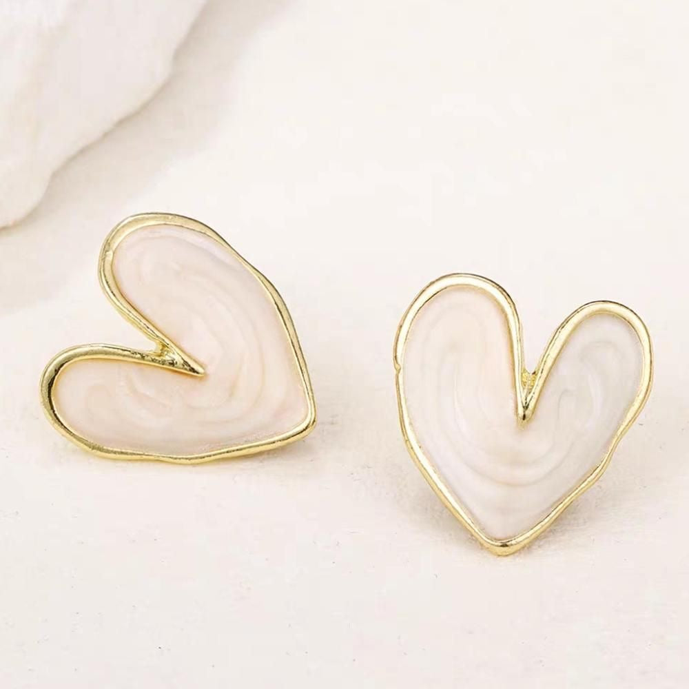White enamel heart earrings