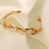 Golden pearl wave cuff bracelet