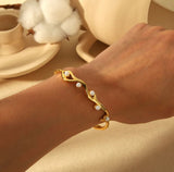 Golden pearl wave cuff bracelet