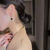 Black clover huggies earring